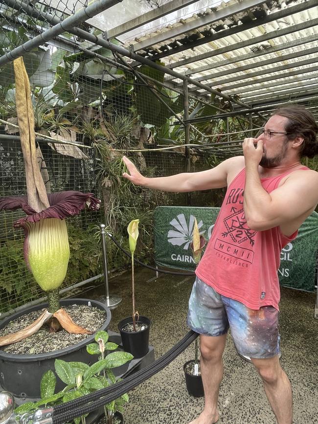 Edge Hill local Adam Mason-Smith reacts to the smell of the Giant Corpse Lily