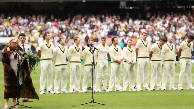 Scott Boland, third right, during the Welcome to Country ceremony by senior Wurundjeri elder of the Kulin Nation, Aunty Joy Murphy Wandin, before the third Test at the MCG Picture: Getty Images