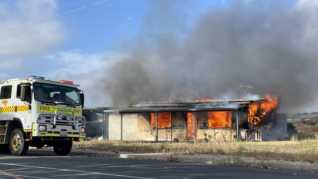 Sean Williams, then 16, rushed to save a woman from the blaze.