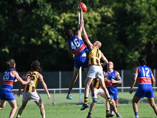 Caiden Gardiner jumps against Jarryd Flint during the AFL Cairns menÃ¢â&#130;¬â&#132;¢s match between the Manunda Hawks V Centrals Trinity Beach Bulldogs at the Trinity Beach Sports Club. Picture Emily Barker