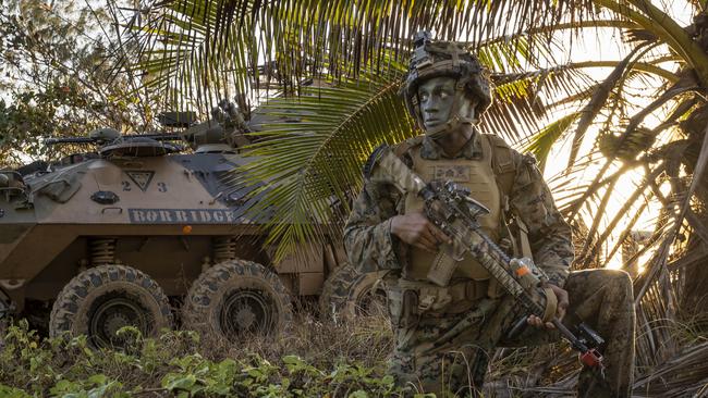 United States Marine Sergeant Alexander Thomas from the 1st Battalion, 7th Marines, secures Forrest Beach, Queensland, as part of an amphibious assault activity, during Exercise Talisman Sabre 2021. Picture: Corporal Jarrod McAneney