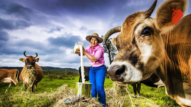 Kay Tommerup with some of the rich Jersey milk that goes into their Jersey Girl range of producrs. Picture: Nigel Hallett