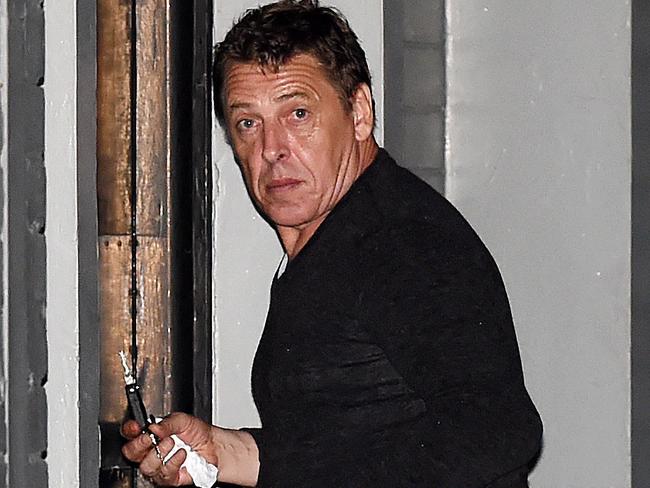 Bomber Stake Out, Mark Thompson arriving back at his home in Port Melbourne just before 10 pm this evening. Picture: Lawrence Pinder
