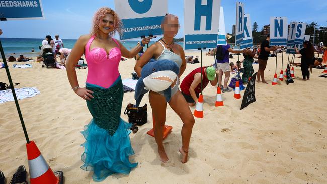 Angela Banovic (left) at Manly beach in Sydney in December 2016 to protest against the use of shark nets along the NSW coast. Picture: Britta Campion / The Australian 