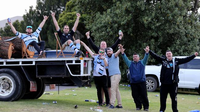 The players weren’t the only ones.Cronulla fans were still celebrating at 7am outside the club. Picture: Stephen Cooper