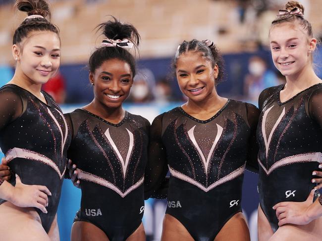 Sunisa Lee, Simone Biles, Jordan Chiles and Grace McCallum of Team United States pose for a photo during Women's Podium Training ahead of the Tokyo 2020 Olympic Games.