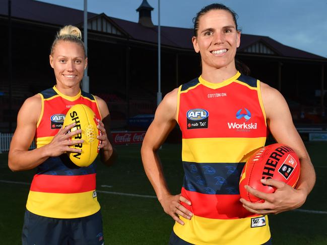 Adelaide Football Club players and Crow Co-captains Erin Phillips and Chelsea Randall pose for a photograph at the Norwood Oval, Norwood, Adelaide on Wednesday the 31st of January 2018. The AFLW season launches on Friday and the Crows play on Saturday against Brisbane. (AAP/ Keryn Stevens)