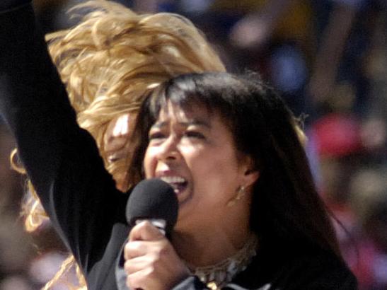 Eighties pop star Irene Cara perform at the AFL Grand Final in Melbourne, Saturday Sept. 30, 2006. (AAP Image/Julian Smith) NO ARCHIVING, EDITORIAL USE NEWSPAPERS ONLY