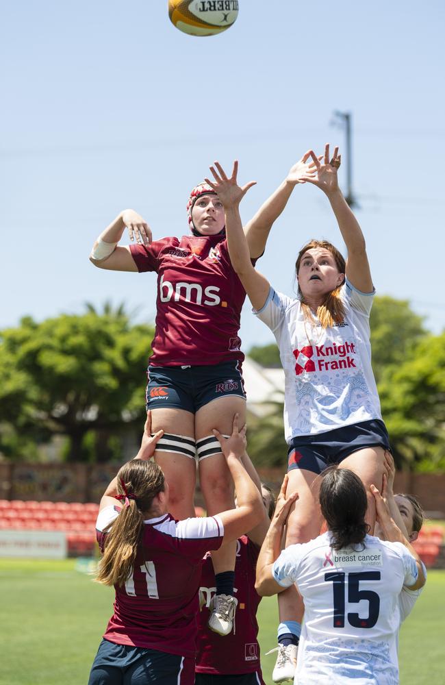 Taleah Ackland (left) of Queensland Reds competes in the lineout against Edie Burke of New South Wales Waratahs as Downs Rugby host Next Gen 7s at Toowoomba Sports Ground, Saturday, October 12, 2024. Picture: Kevin Farmer