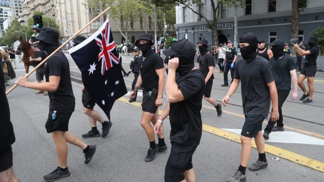 Saturday's protest was crashed by pro-Nazi demonstrators in face coverings. Picture: NCA NewsWire / David Crosling