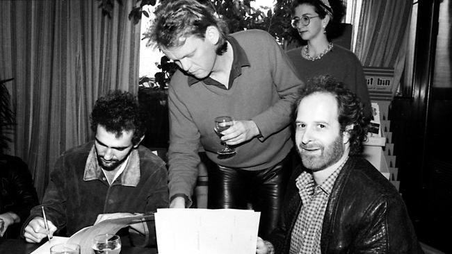 Paul Kelly with Stuart and Gudinski re-signing with Mushroom Picture: Ian Greene