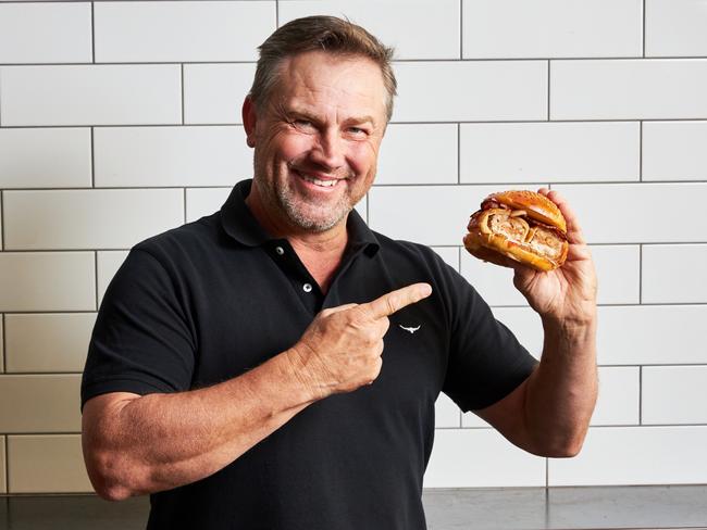 EMBARGOED UNTIL WEDNESDAY 6th OCT, 2021, EMBARGOED UNTIL WEDNESDAY 6th OCT, 2021, EMBARGOED UNTIL WEDNESDAY 6th OCT, 2021, EMBARGO Wednesday 6th October – , , The Footy Finals may be over, but Adelaide burger institution Bread & Bone has found a way of still keeping the footy at the front of your mind, teaming up with Adelaide Crows Hall of Famer and AFL Legend TONY MODRA to bring you an iconic Australian limited edition burger …..THE GODRA.