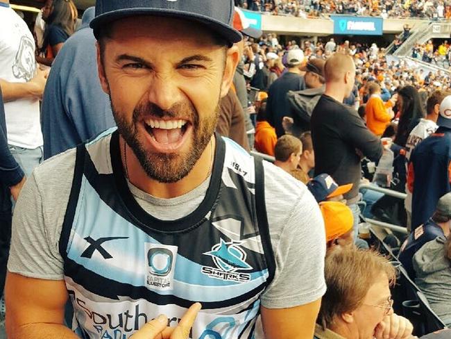 Sharks tragic Daniel Macpherson celebrates after Cronulla broke its premiership hoodoo in 2016.