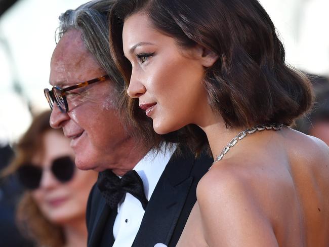 CANNES, FRANCE - MAY 17:  Mohamed Hadid (L) and Bella Hadid attend the "Ismael's Ghosts (Les Fantomes d'Ismael)" screening and Opening Gala during the 70th annual Cannes Film Festival at Palais des Festivals on May 17, 2017 in Cannes, France.  (Photo by Pascal Le Segretain/Getty Images)