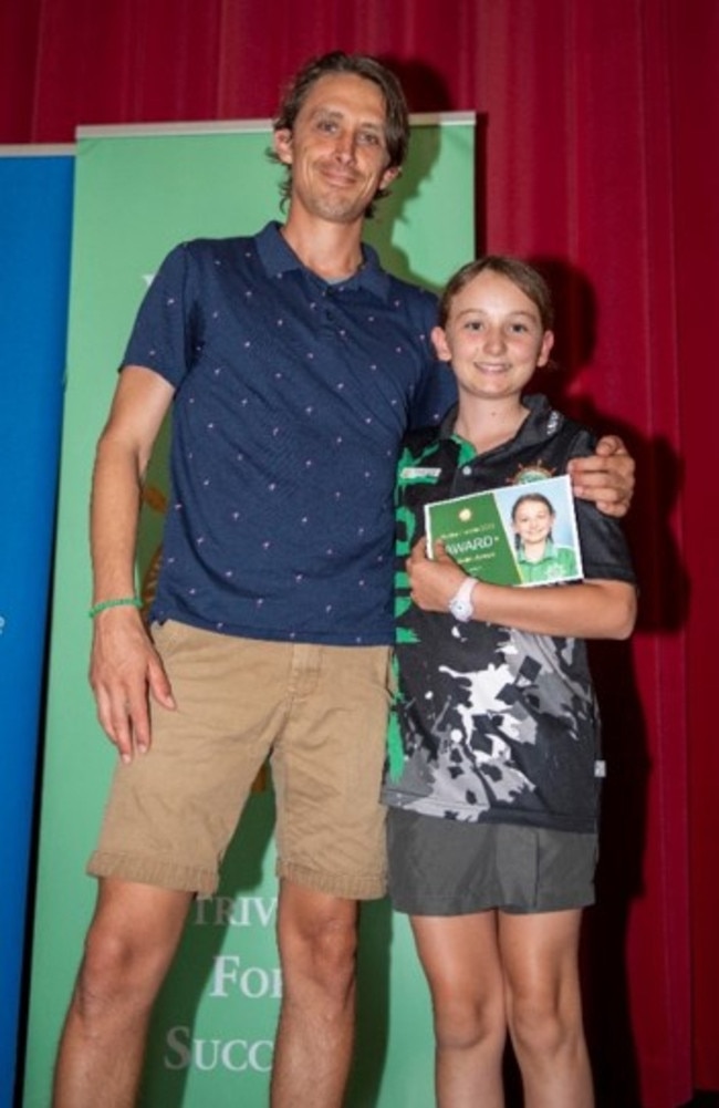 When she grows up, Annabella wants to become a teacher or work with animals. Photo taken with her dad.