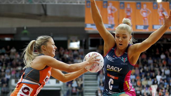 Giants wing attack Sarah Wall evades Vixens centre Kate Moloney during their match in Canberra. Picture: Getty Images