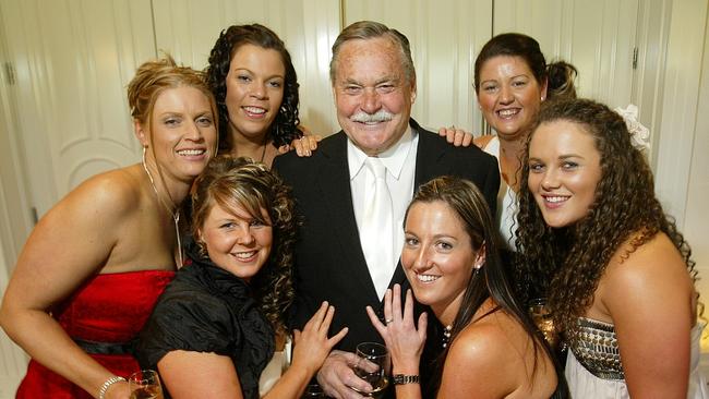 Ron Barassi at the VCFL Premiers Dinner in 2010 with guests from Lexton Football-Netball Club, Olivia Lockhart, Renee Viney, Kerrieann Lockhart, Kimberley Roberts, Sarah Fisher and Lauren Anderson.