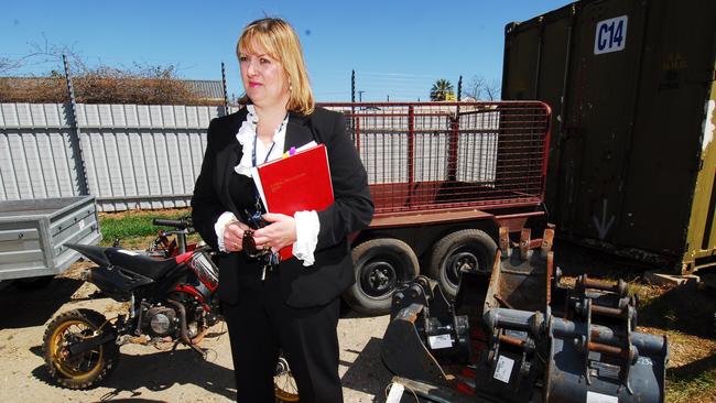 Assistant Commissioner Joanne Shanahan with repossessed goods.