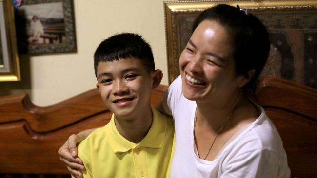 Dom Promtep and his mother Thanaporn Promthep after his rescue in 2018.