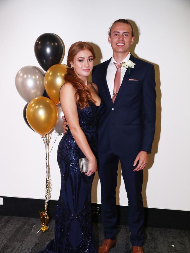 Daisy Winter and Marcus Pratt at Trinity Lutheran College formal at Gold Coast Convention and Exhibition Centre. Photograph : Jason O'Brien