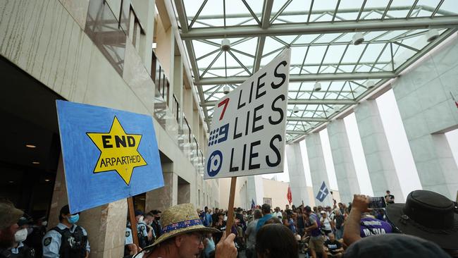 Hundreds of protesters gathered at the entrance to Parliament House in Canberra on Monday. Picture: NCA NewsWire / Gary Ramage Picture: NCA NewsWire / Gary Ramage