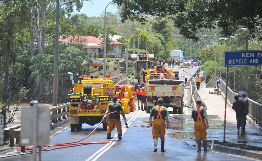 Maryborough floods - work begins on cleaning up the Granville Bridge and reopening it to traffic. Photo: Alistair Brightman / Fraser Coast Chronicle. Picture: Alistair Brightman