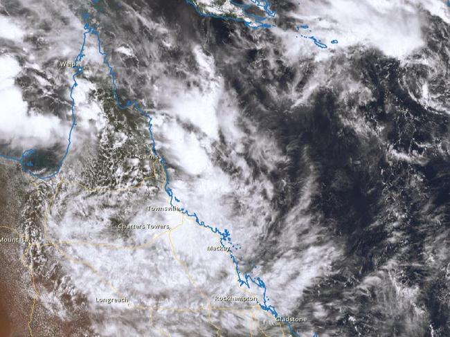 A satellite image of the tropical low sitting over North Queensland at midday on Sunday.