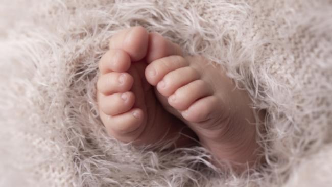 Tracy Martindale has reminded new parents not to forget the little details, like tiny hands and feet, when taking photos of their new babies. Picture: Bee Cherished Photography