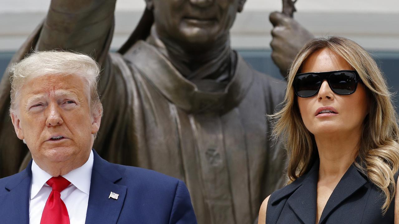 President Donald Trump and first lady Melania Trump outside the Saint John Paul II National Shrine on Tuesday. Picture: Patrick Semansky/AP