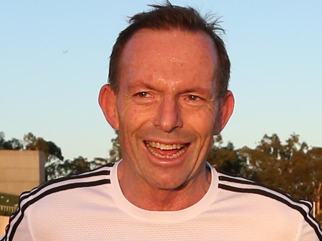 Prime Minister Tony Abbott going for a morning run with QLD Premier Campbell Newman in Canberra .