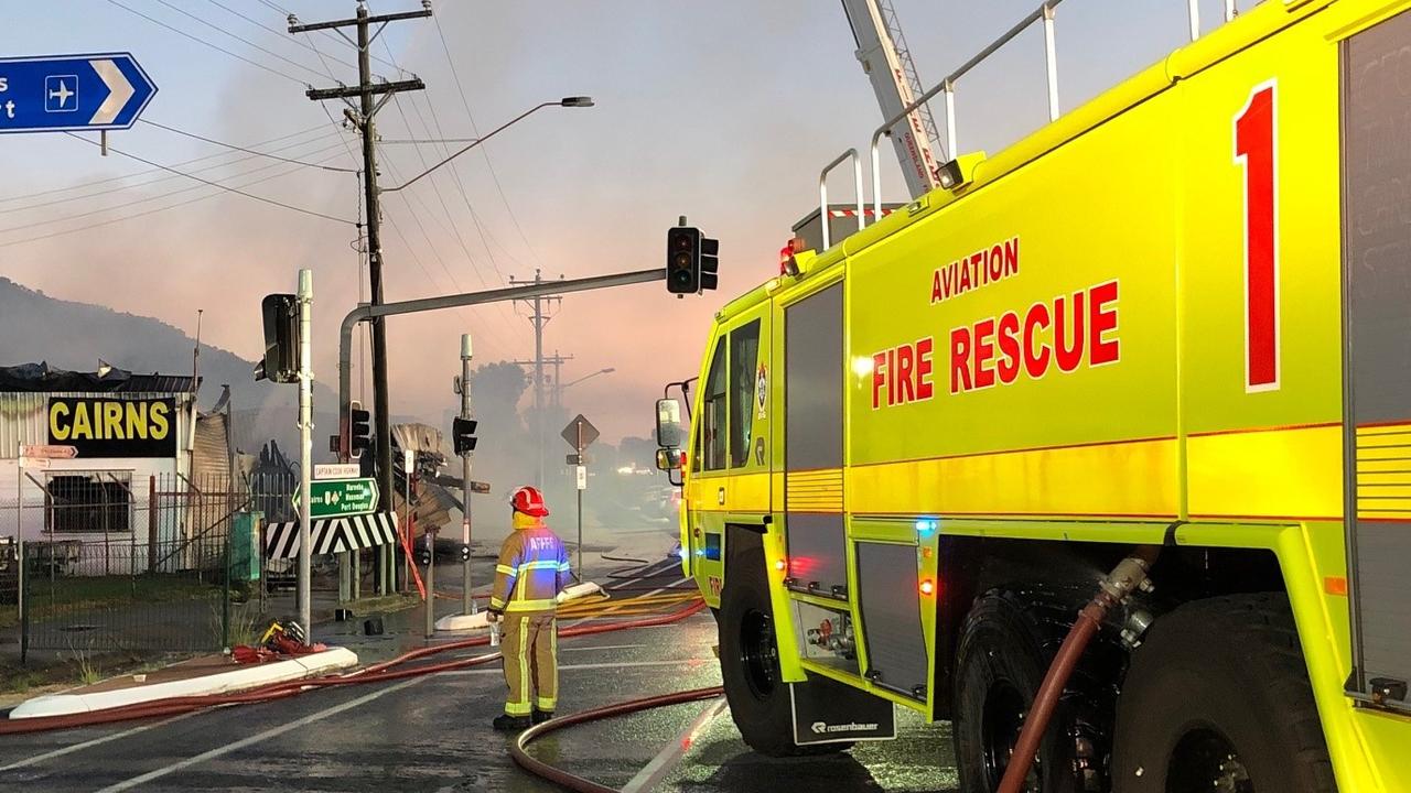 Aviation Rescue Fire Fighting Service firefighters stationed at Cairns Airport assisted local fire service to extinguish a fire in Carins. Picture: Jennifer Leighton