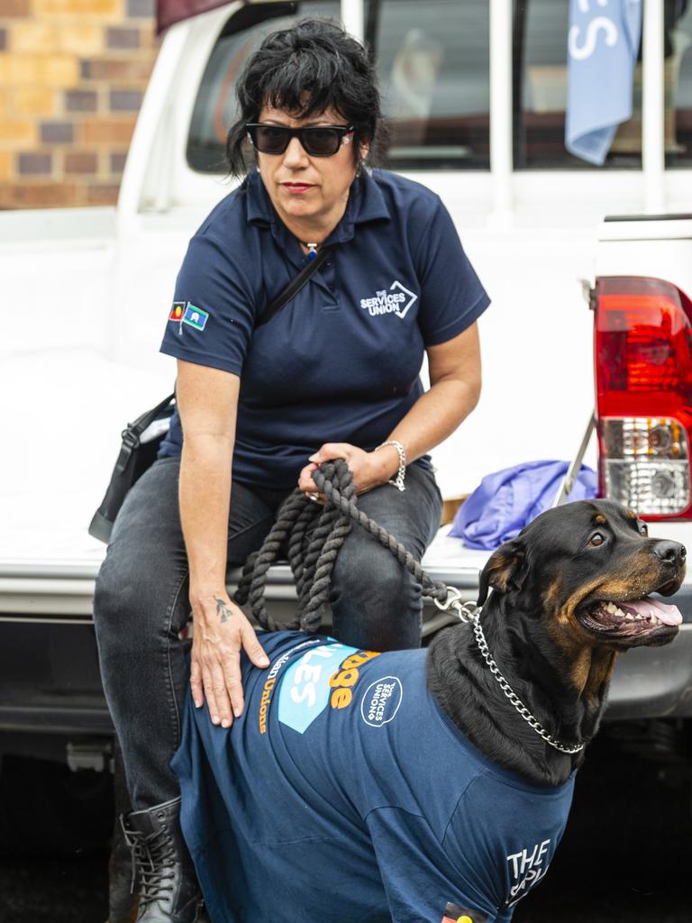 Claudia Reyes and her rottweiler Logan show support for The Services Union at the Labour Day 2022 Toowoomba march, Saturday, April 30, 2022. Picture: Kevin Farmer