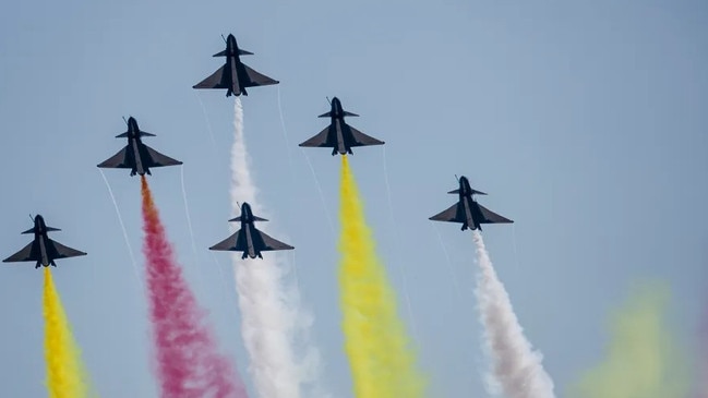 China’s J-10 fighter jets in the skies over Zhuhai, southern China. Picture: Getty Images.