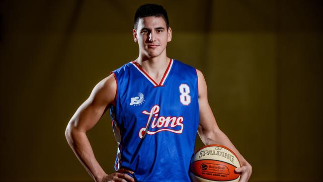 Central Districts basketballer Jordan Centenera wasn't even born when the Lions last played in the men's state league finals. Profile pic and jumping actin shot at Starplex Gawler Evanston.