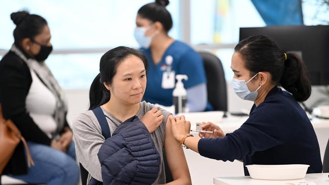 A woman receives a Covid-19 vaccine at the Sydney Olympic Park vaccination hub. Picture: NCA NewsWire / Jeremy Piper