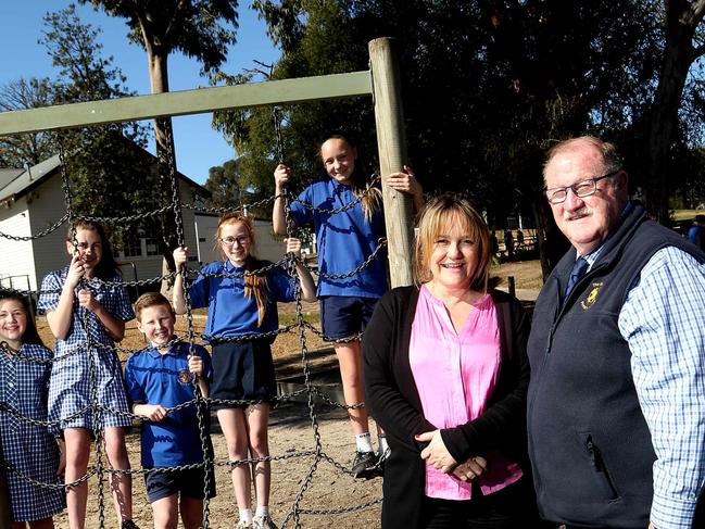 Students (L - R) Olivia, Scarlett, Riley, Teannah and Tahlia with Donna Krenn and principal Graeme Russell at The Basin Primary School on Wednesday, September 11, 2019, in The Basin, Victoria, Australia. Picture: Hamish Blair