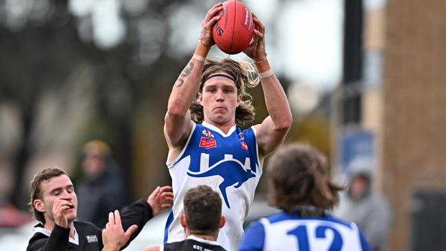 EDFL: Sunbury Kangaroos’ Dean Halliwell takes the ball against Moonee Valley. Picture: Andy Brownbill