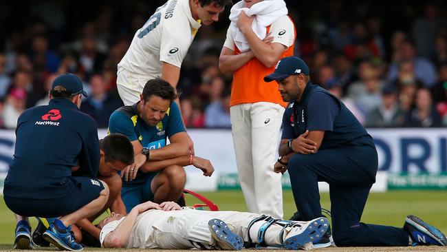 Australia's Steve Smith lies on the pitch after being hit in the head. Picture: AFP