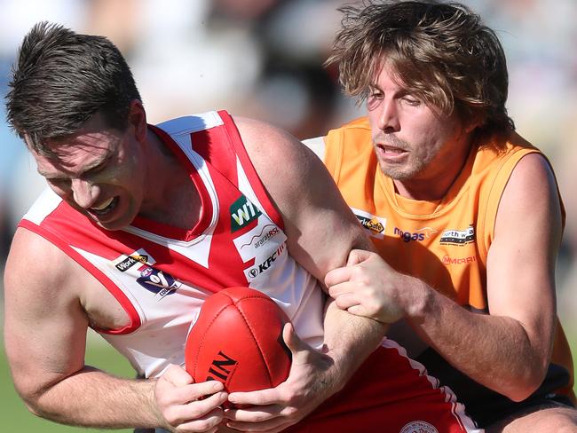 Wimmera FNL, Grand Final, Southern Mallee Giants V Ararat Rats, at Dimboola, Billy Lloyd, 27,  Southern Mallee Giants   & Daniel Mendes, 13,   Ararat Rats,   Picture Yuri Kouzmin