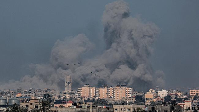 Kites are flown over Rafah as smoke billows following Israeli bombardment on Khan Yunis in the southern Gaza Strip. Picture: AFP