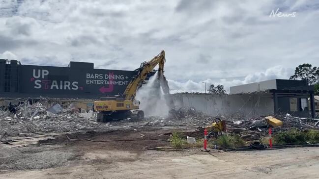 Down it comes: Toombul Shopping Centre demolition under way