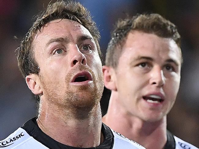 Panthers players look on following a Titans try during the Round 5 NRL match between the Gold Coast Titans and the Penrith Panthers at CBUS Stadium on the Gold Coast, Friday, April 12, 2019. (AAP Image/Dave Hunt) NO ARCHIVING, EDITORIAL USE ONLY