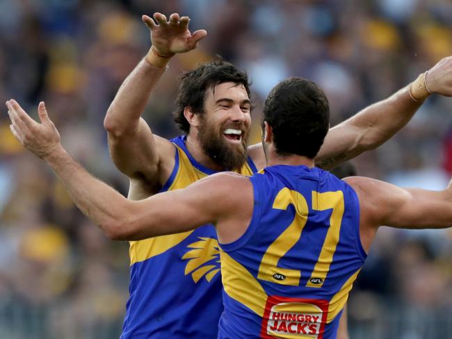 Jack Darling (right) of the Eagles is congratulated by Josh Kennedy after kicking a goal during the Round 9 AFL match between the West Coast Eagles and the Richmond Tigers at Optus Stadium in Perth, Sunday, May 20, 2018. (AAP Image/Richard Wainwright) NO ARCHIVING, EDITORIAL USE ONLY