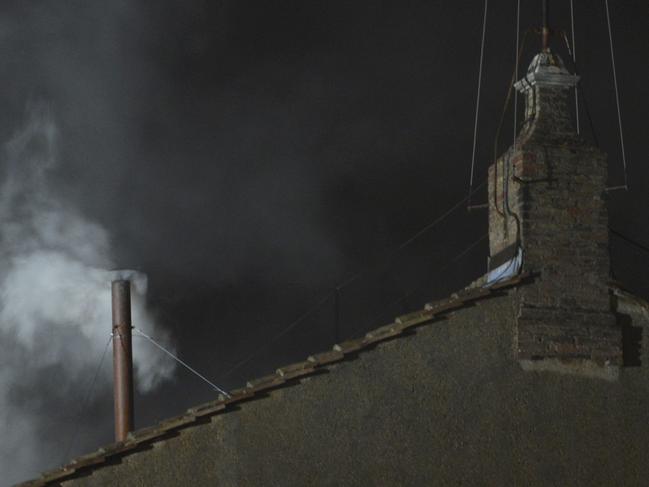 White smoke rises, meaning that cardinals elected a new pope. Pope Francis was elected within 24 hours of the conclave votes starting in 2013. Picture: AFP