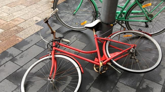 Resident says discarded bikes are becoming an eyesore across Manly. Picture Warwick Edman