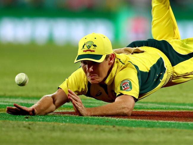 Australia's Adam Zampa attempts to stop a boundary during the One Day game between Australia and Pakistan at the Sydney Cricket Ground . Picture : Gregg Porteous