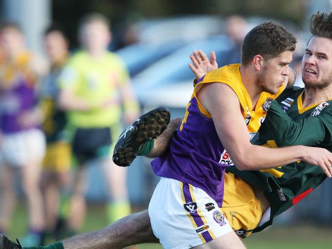 Football GDFL: Werribee Centrals v Thomson. Thomson 34 Jake Alderding tackles Werribee Centrals 43 Josh Sutton Picture: Mark Wilson