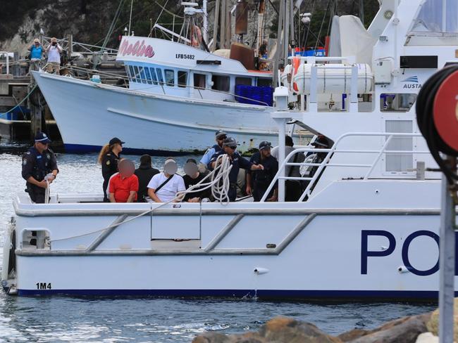 Police escorted a group of passengers off the Carnival Legend after a massive brawl erupted on board.