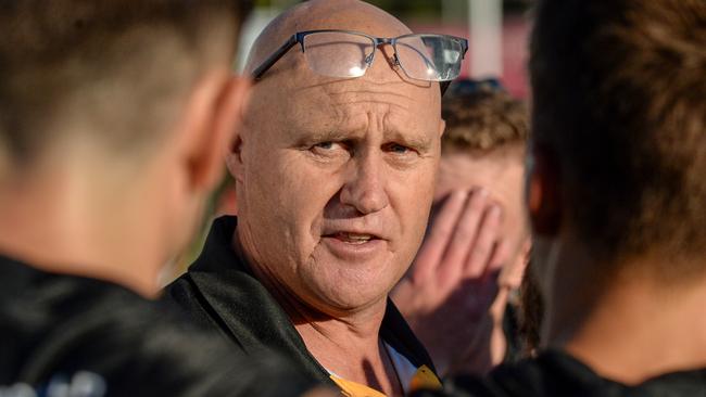 Glenelg coach Brett Hand addresses his players during their comeback from 41 points down to beat Adelaide at the Bay on Saturday. Picture: Brenton Edwards.