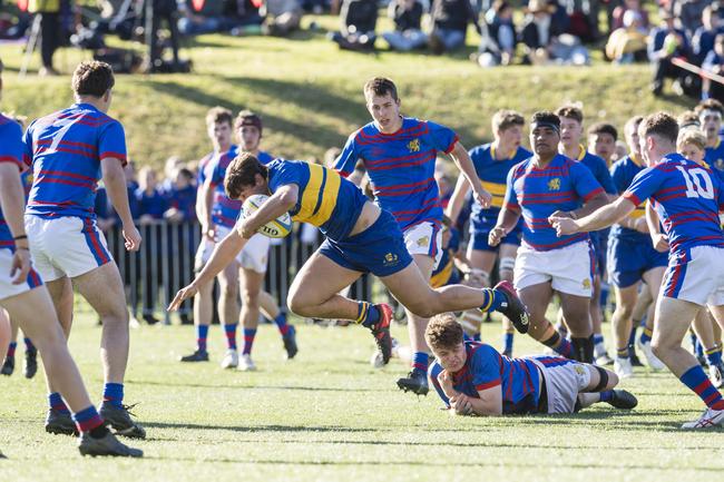 Toowoomba Grammar's Tom Bailey gets away from the Downlands players in the 2023 O'Callaghan Cup match. Picture: Kevin Farmer.